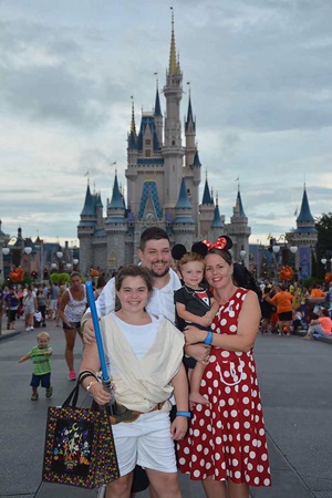 charles spine patient in Disney with family 